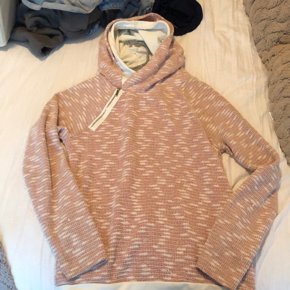 Pink and white sweater with pockets